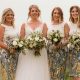 Bride and bridesmaid standing together with bouquets