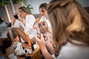 The bridal party doing their own makeup at home